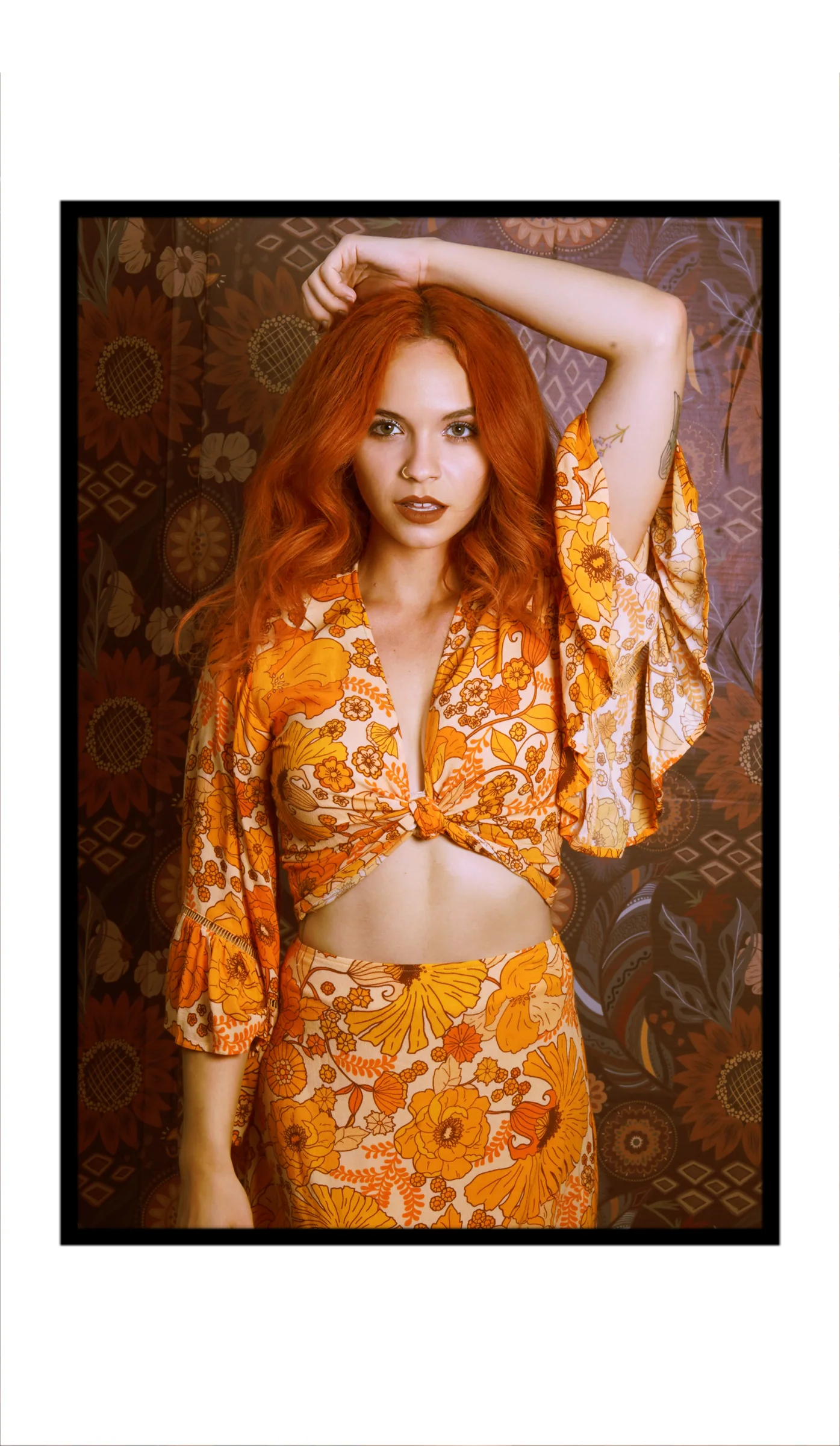 Expressive fashion portrait in warm, patterned color