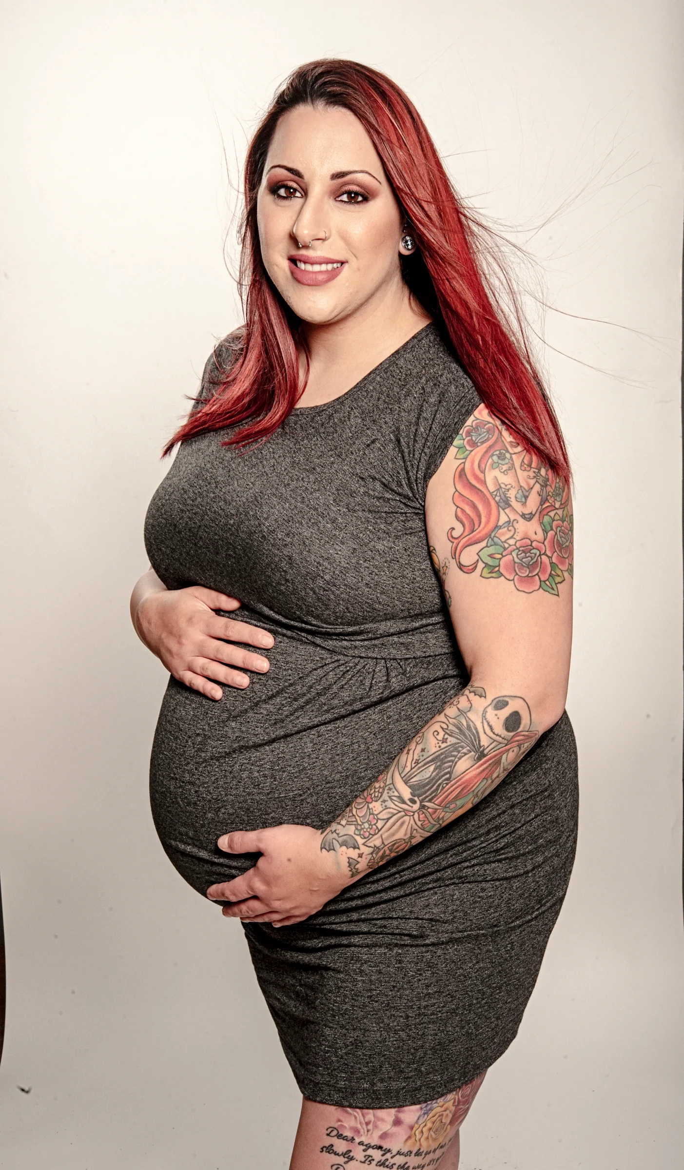 Expectant mother in a calm, considered portrait