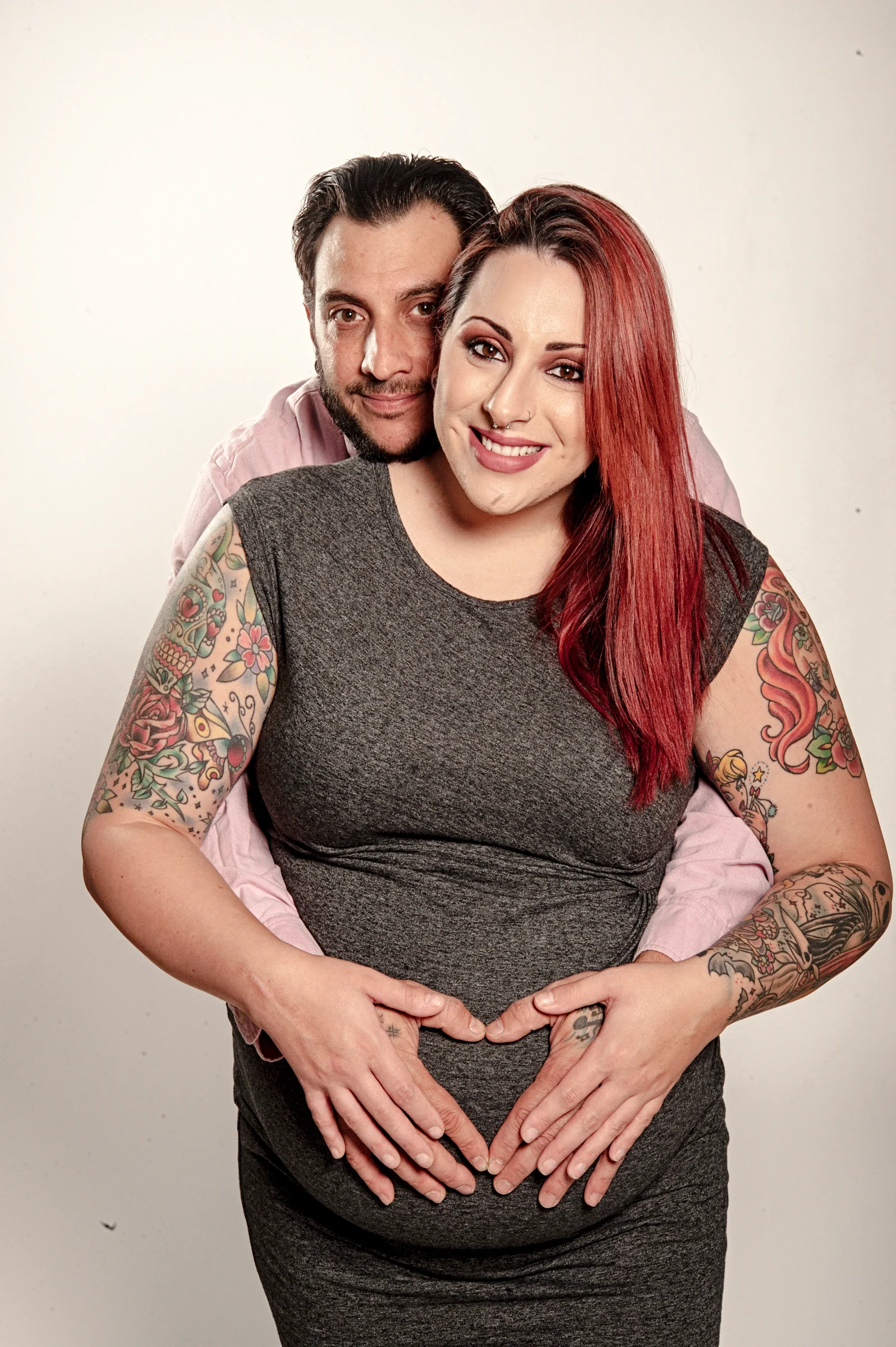 Expectant couple sharing a maternity portrait